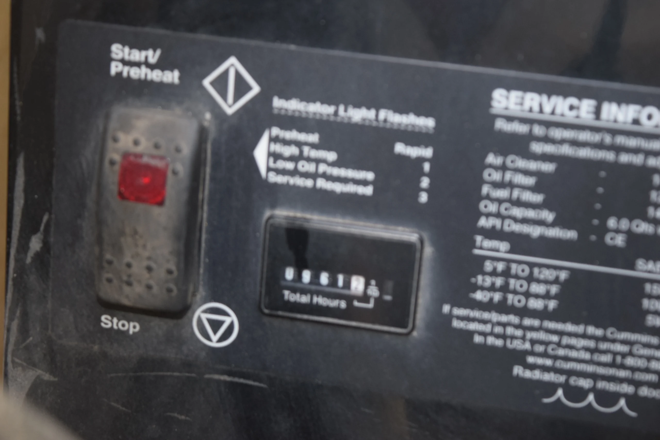 DSC_0576 Control panel with a red start/preheat button, service info, indicator light flashes, and total hours display. Relevant for Motorcoach and RVs.