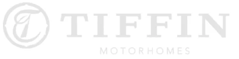 Tiffin Motorhomes logo featuring a stylized "T" inside a circle, with the words "TIFFIN MOTORHOMES" in uppercase letters.