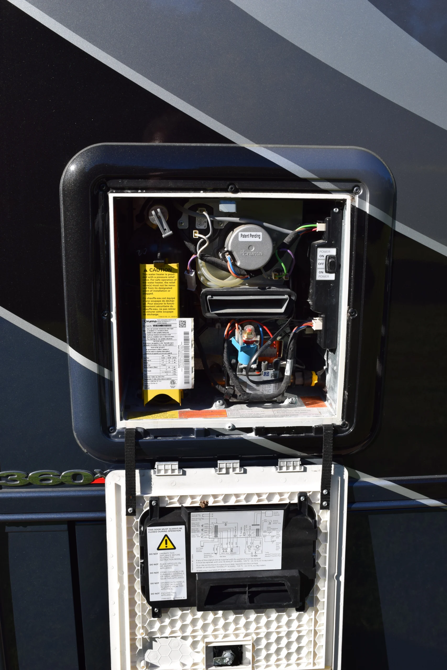 DSC_0704 RV panel with wiring, caution labels, and power switch. Suitable for Motorcoach and Rvs.