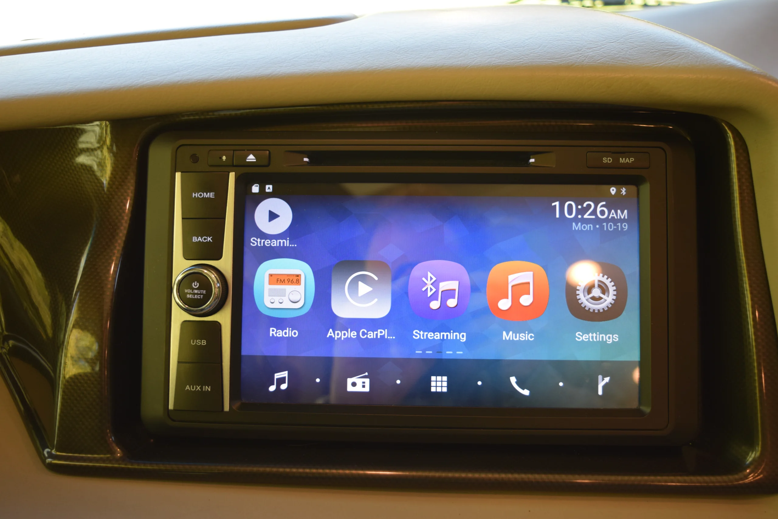 DSC_0714 Touchscreen infotainment system displaying apps like Radio, Apple CarPlay, Streaming, and Music, common in Motorcoach and RVs.