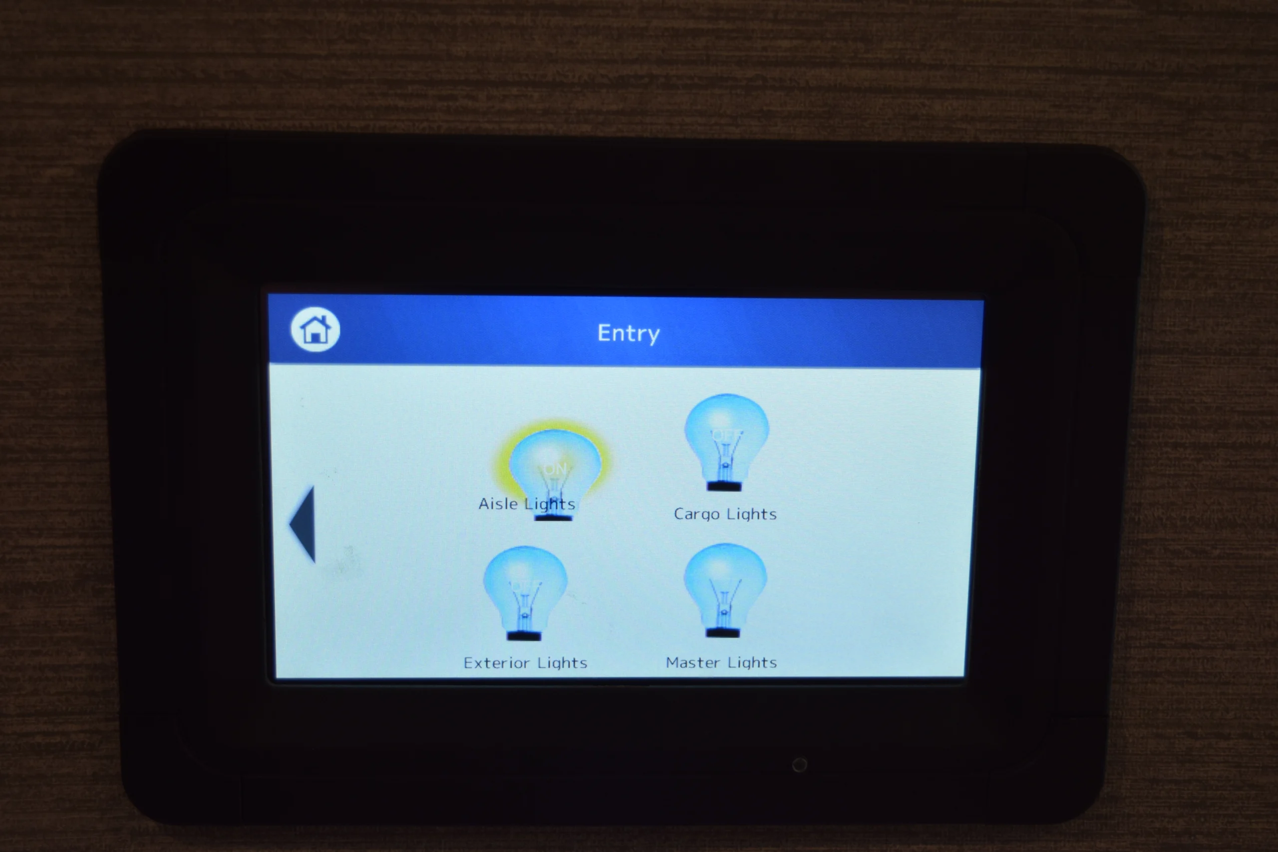 DSC_0759 Touchscreen panel for controlling lights in Motorcoach and RVs; aisle lights are on, cargo, exterior, and master lights are off.