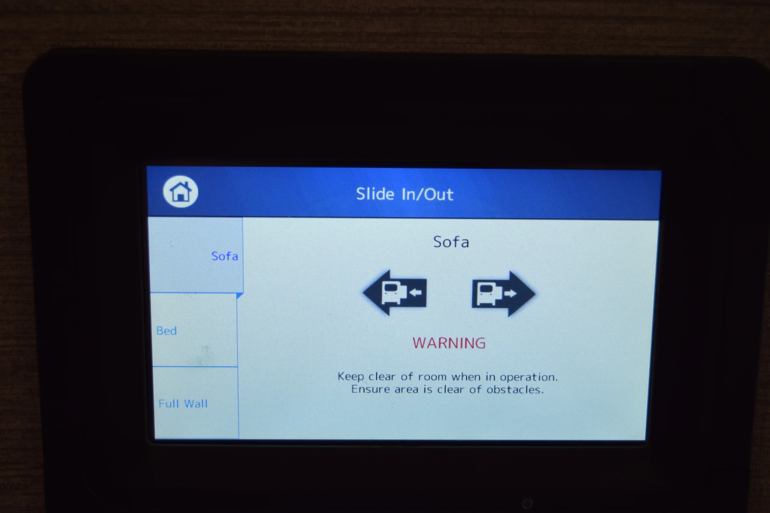 DSC_0761 Touchscreen display for motorcoach and RVs. Slide-out controls for sofa, bed, and full wall with warning about clearing obstacles.