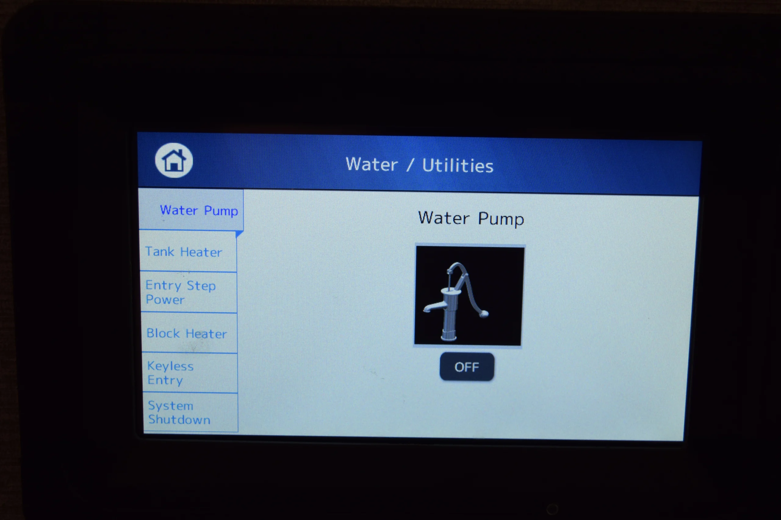 DSC_0763 Control panel for Motorcoach and RVs, showing water pump status as off with options for tank heater, step power, block heater, keyless entry.